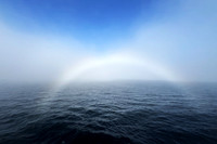 Fog bow or white rainbow, The Minch, Isle of Skye to Isle of Harris ferry, Scotland - August 2025