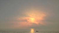 Fishing boat setting out to sea from Scarborough early morning - March 2026